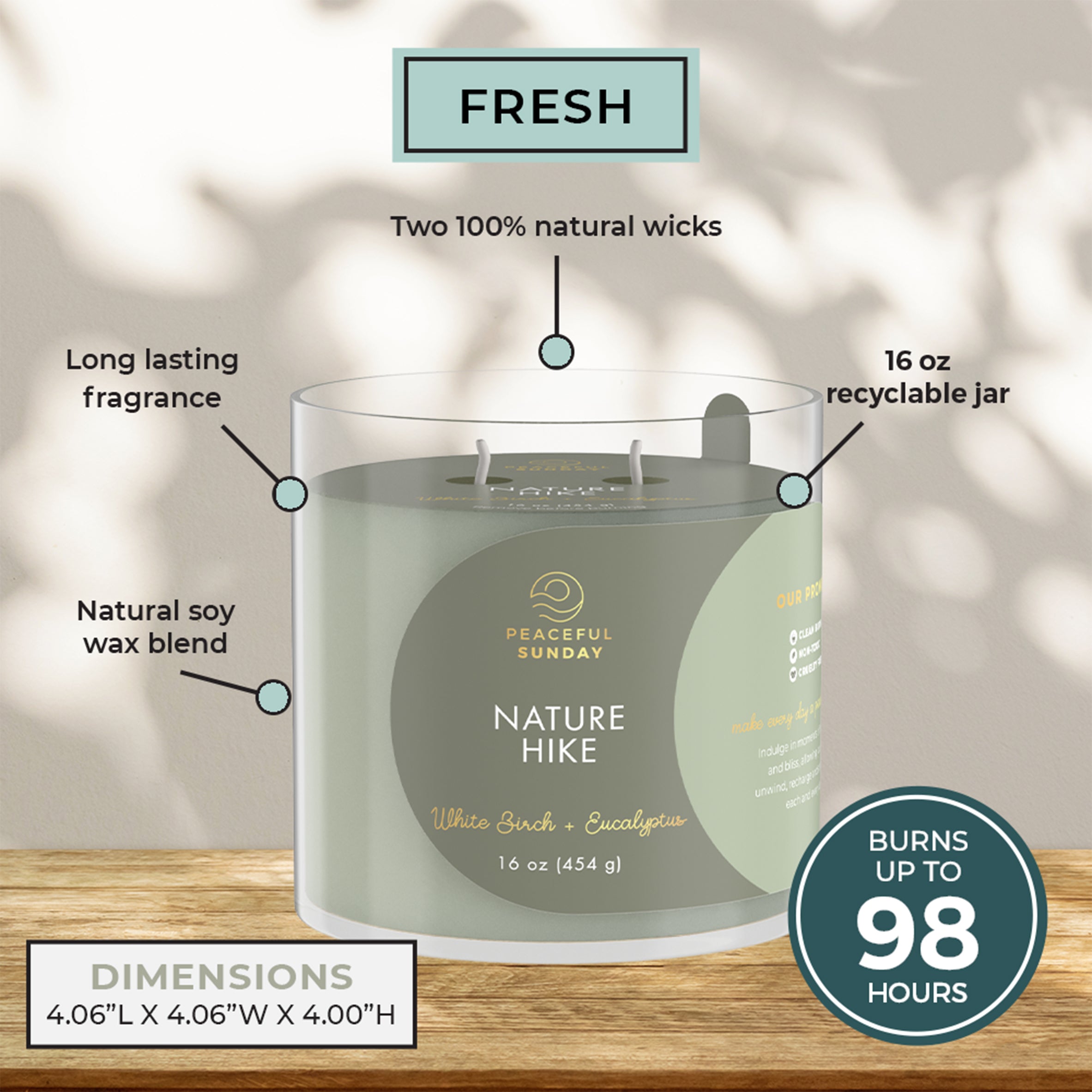 Candle labeled 'Nature Hike' with features highlighted on a neutral background