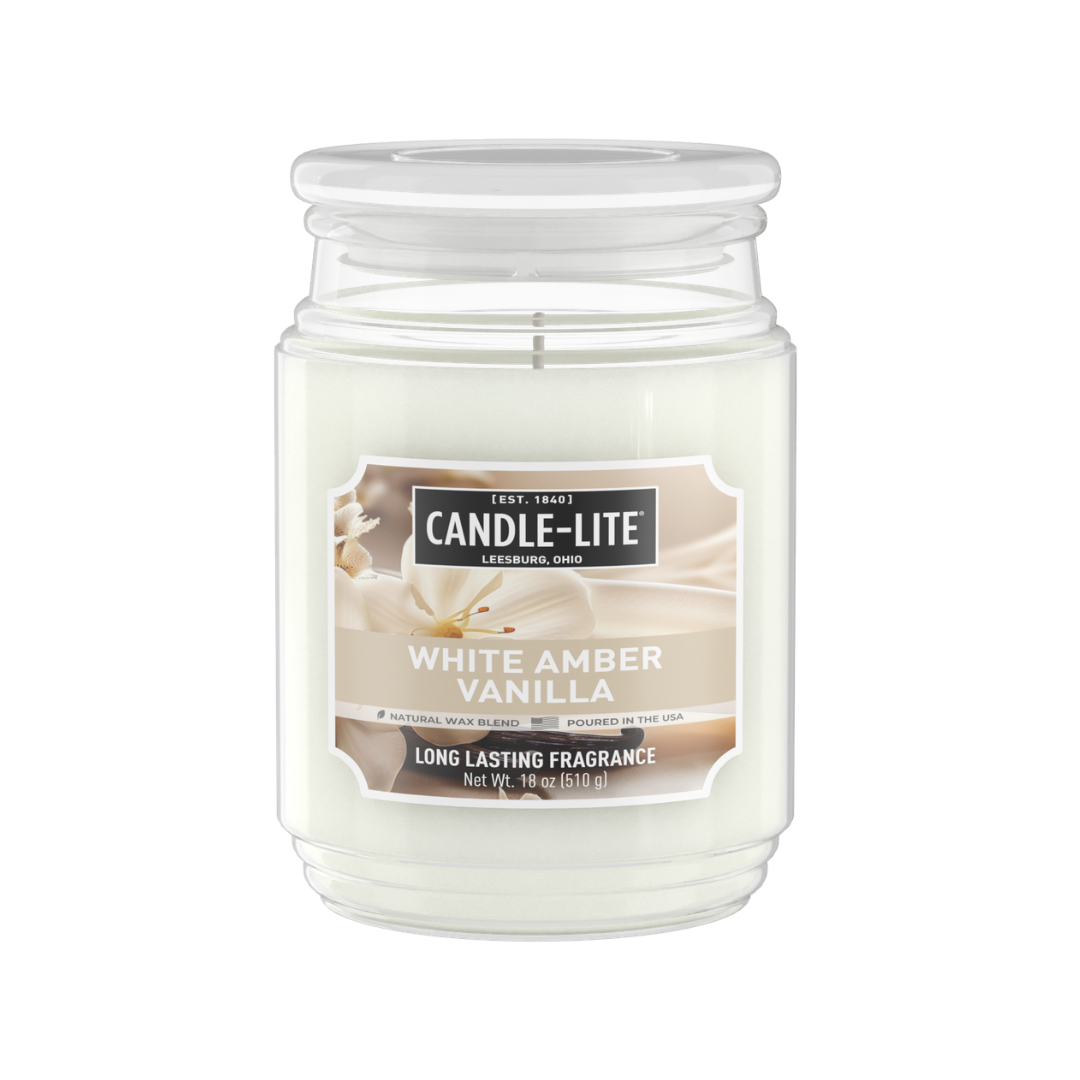 Candle-Lite White Amber Vanilla candle in a glass jar on a white background